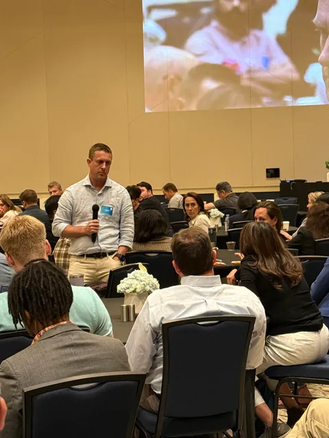 A GenAIPI facilitator taking questions during a live training session