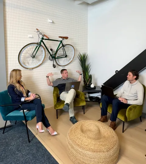 GenAIPI executive team collaborating in the office